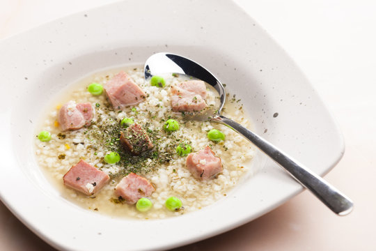 smoked meat bouillon with pearl barley and peas
