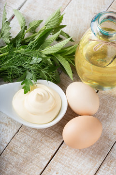 Mayonnaise in bowl on table