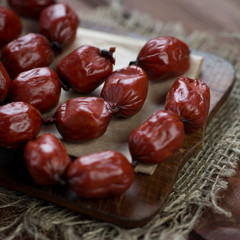 Close-up of smoked mini sausages, studio shot