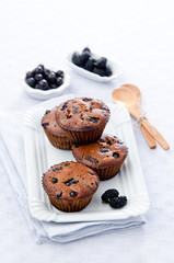 Muffins with chocolate and berries