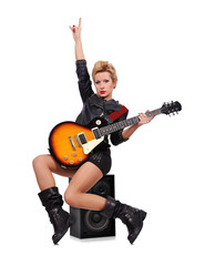 rock girl sitting on speaker