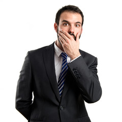 Fototapeta premium Businessman surprised over white background