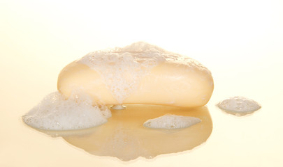 Beige soap in the foam