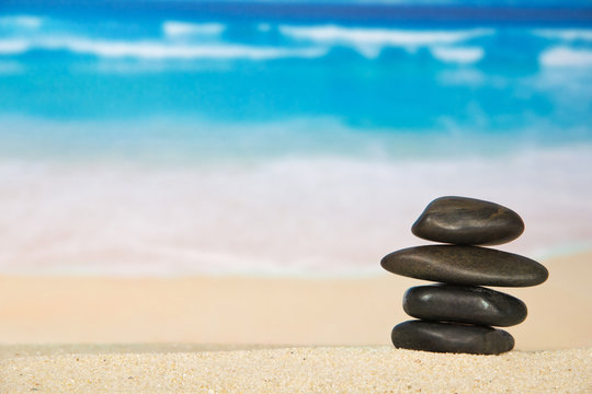 Pebbles on the sandy coast