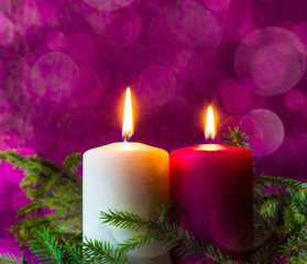 Obraz na płótnie Canvas Christmas ornaments lighted candles spruce twigs