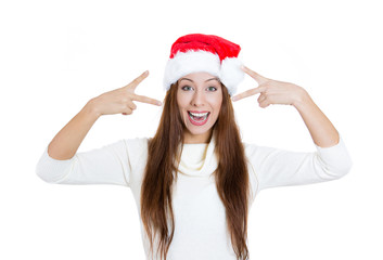 Happy christmas girl showing victory sign