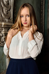 beautiful woman in  Studio with interior of old palace.