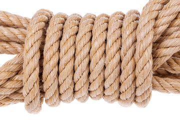 Coil of rope twisted into a roll. On a white background.