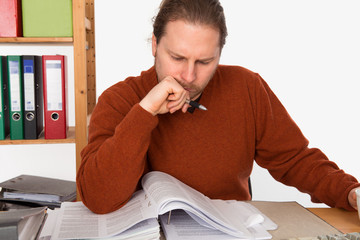 man in office is reading