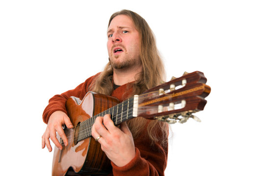 man is playing the guitar