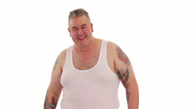 Freaky tattooed man posing.
