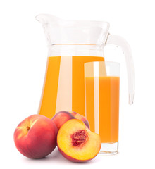 Peach fruit juice in glass jug