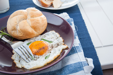 Bright concept of breakfast with egg