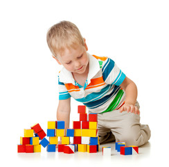 kid boy playing  wooden toys