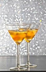 glasses of fresh cocktail with ice on bar table