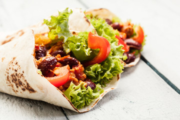 Tortilla with meat and beans