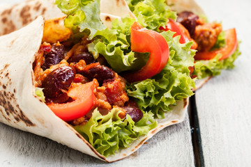 Tortilla with meat and beans