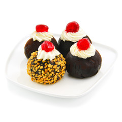 Chocolate cakes with cream and jelly