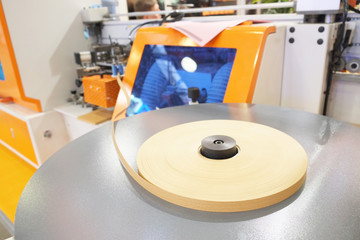 machine for sticking on adhesive tape