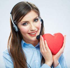 Woman call center operator hold love symbol Red heart. Close up