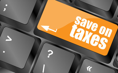 save on taxes word on laptop keyboard key, business concept