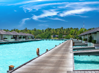 Fototapeta premium houses on piles on sea. Maldives.