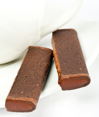 Chocolate sticks on a saucer