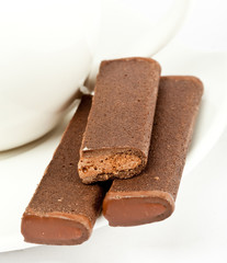 Chocolate sticks on a saucer