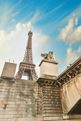 Fototapeta na wymiar Paris. Upward view of Eiffel Tower and Iena Bridge from Seine Ri