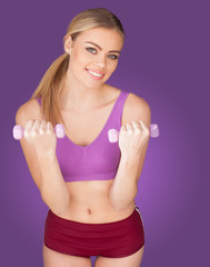 attractive woman exercising with dumbbell