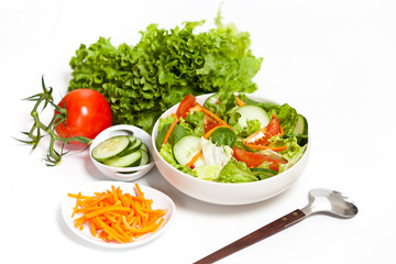 Fresh salad with tomato, cucumber and carrots
