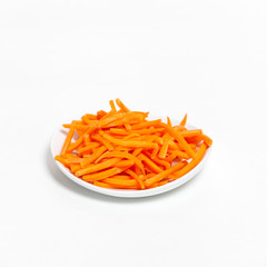 Freshly shredded carrots in small dish