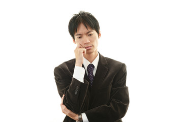 苦悩するビジネスマン