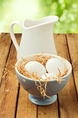 Fresh farmer eggs on wooden table
