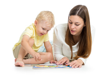 kid and mother play together with puzzle toy