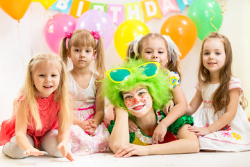 Fototapeta premium jolly children and clown on birthday party