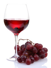 glass of wine and grapes, isolated on white