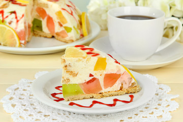 Delicious jelly cake on table close-up