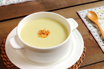 Zucchini or courgette soup with dry fried onions