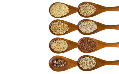 collection of grains in wooden spoon