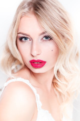 Fototapeta na wymiar glamor portrait of beautiful sexy blonde with red lips