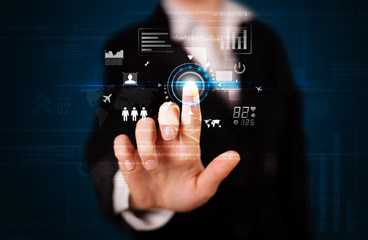 Young businesswoman touching future web technology buttons and i