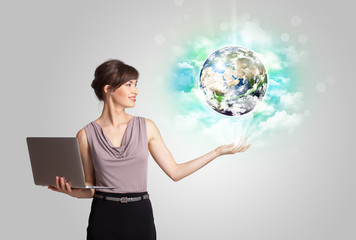 Young woman with earth and cloud concept