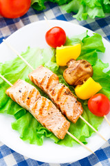Grilled salmon and vegetable skewers