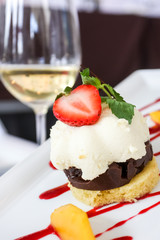 Dessert with biscuits, chocolate and strawberry