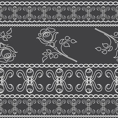 Seamless background of white lace strips on a dark background.