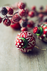 Fototapeta na wymiar Old fashion christmas ornaments on wooden background