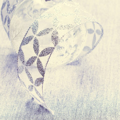 White Christmas. Christmas Decorations with silver ribbon close