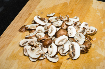 Sliced mushrroms on a cutting board