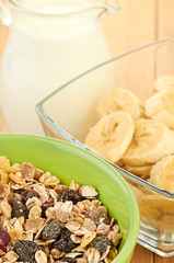 Delicious and healthy cereal in bowl with milk